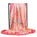 Close-up of floral satin scarf with coral and red patterns showing silky texture - Coral Orange Floral (#17)