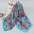 Lake blue 90cm paisley satin scarf with floral patterns tied on a white handbag - Royal Blue Paisley