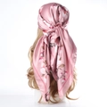 Elegant cherry blossom pink satin silk scarf tied as headscarf on a model - Plum Blossom Pink