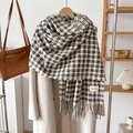 Black and white checkered cashmere scarf with fringe paired with a beige wool coat - Off-white