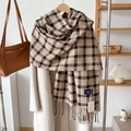 Plaid cashmere-like winter scarf with tassels on a wooden hanger with a beige coat - Khaki / Over 175cm