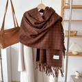 Detail of soft cashmere-feel scarf with plaid pattern and tassels on beige coat - Dark Coffee