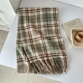 Detailed view of soft plaid scarf with tassels in earth tones and knit cashmere texture - Iron Green