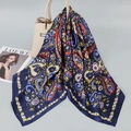 Navy blue paisley print satin silk square scarf draped on a beige leather handbag - Navy Paisley