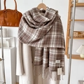 Close-up of brown and white checkered cashmere-feel scarf with elegant fringe detail - Over 175cm / Khaki
