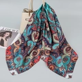 90cm square paisley satin silk scarf in lake blue and vermilion on a handbag - Lake Green Paisley