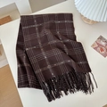 Deep brown plaid scarf with white and orange accents and fringe edges on a white desk - Brown / 196cm