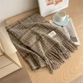 Brown plaid scarf with fringe tassels and woven tag on a wooden table with coffee - Over 175cm / Light Coffee