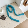 Vibrant blue 100% wool knit scarf in a skinny tube design on minimalist background - Lake Blue