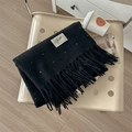 Black knit scarf with colorful polka dots and fringe trim in a soft aesthetic style - Black