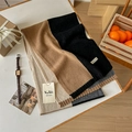 Detailed view of 100% Australian wool scarf featuring black and beige color-block knit texture - 135-175CM / Black Camel