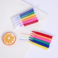 Set of 6 mini watercolor pens on a white notebook for children's DIY art and drawing - Multi-color Watercolor Pens