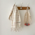 Soft plaid cashmere-like scarf in cream with red-orange checks and tassels - 196cm x 65cm / Cream