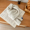 Solid cream knit scarf with classic ribbed texture and small woven label detail - Off White / 60-80cm