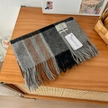 Detail shot of 100% pure wool scarf showing classic plaid texture and tassel edges - 188x32cm / Gray Black Brown Plaid (10)