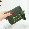 Green leather mini cat coin purse with tassel and star zipper pull in hand - Green
