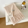 Soft cream-colored wool scarf featuring elegant long tassel edges and premium knit texture - 175cm+ / Cream Rice