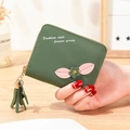 Dark green short PU leather wallet for women with flower detail and tassel zipper - Green
