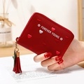 Red long zip wallet for women featuring heart embroidery and a decorative tassel - Burgundy