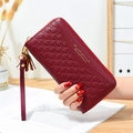 Long zip-around wine red wallet with embossed patterns, wrist strap and gold tassel detail - Wine Red