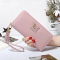 Pink faux leather butterfly wallet for women with wrist strap and tassel detail - Light Pink