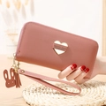 Long dusty pink women's wallet with heart hardware, wristlet, and rabbit pendant charm - Dust Rose