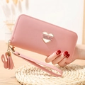 Pink long wallet for women with heart detail and tassel strap in pebbled leather finish - Pink