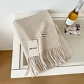 Soft beige wool scarf with fringe detail and woven labels on a clean white surface - 175cm+ / Melange Beige