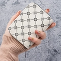 White pebbled leather card holder with black vintage clover patterns and zip closure - Off White