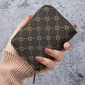 Compact dark brown flower pattern card holder wallet with a gold zipper closure - Brown