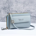 Light blue-grey crossbody phone bag with double zippers and elegant gold hardware - Blue