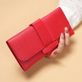 Red long tri-fold faux leather wallet for women with decorative strap and buckle - Red