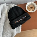 Black knit wool beanie with embroidered dachshund dogs for winter warmth and style - Hat / Black