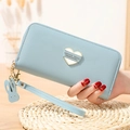Light blue long wallet for women with golden heart plaque and rabbit charm - Blue