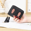 Black rabbit-style small wallet with pink bunny ears and leather tassel charm detail - Black