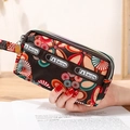 Mini sac à main imprimé floral à trois fermetures éclair avec dragonne tissée - Motif floral