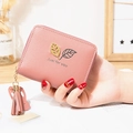 Pink faux leather short wallet with leaf metal accent and decorative tassel fringe - Dust Rose