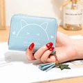 Light blue short wallet for women featuring a cute white cat ear print and star tassel - Blue