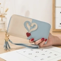 Cartera larga de mujer con cremallera, diseño patchwork azul y crema con borla - Azul