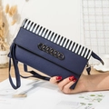 Navy blue lychee leather crossbody phone bag with black and white striped detail - Blue