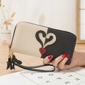 Cartera larga con cremallera para mujer, diseño bicolor blanco y negro con borla - Negro