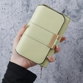 Long sage green women's wallet in matte finish with gold hardware and zipper - Green