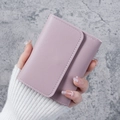 Short mauve bifold wallet with lychee grain leather and contrast stitching - Purple