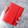 Compact red pebbled leather bifold wallet for women with fine stitching and slim design - Red