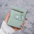 Short mint green women's wallet in pebbled faux leather with snap and zipper detail - Green