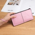 Pink lychee texture long zipper wallet for women featuring a practical wrist strap - Pink