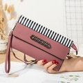 Striped crossbody phone bag in dusty rose pebbled leather with metallic chain detail - Deep Pink