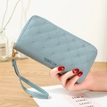 Quilted light blue long wallet for women with crown embroidery and wristlet strap - Blue