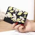 Mini portefeuille pliant en cuir noir avec imprimé floral et fermoir doré - Noir
