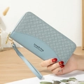 Long light blue PU leather woven clutch wallet for women with gold zipper and wrist strap - Blue